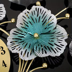 Decorative flower with gold accents on a black background