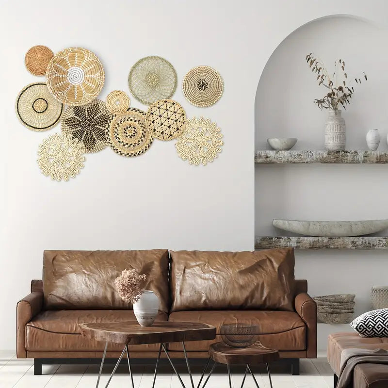 Living room with decorative wall art and a brown sofa.
