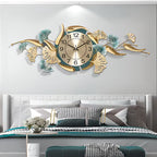 Decorative wall clock with floral designs above a bed in a bedroom setting