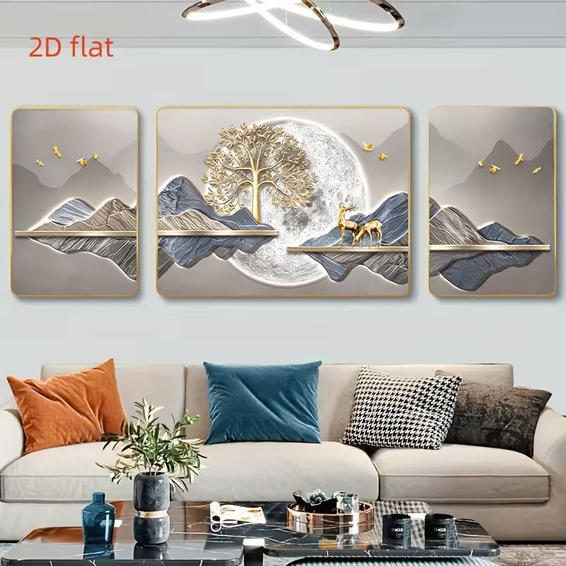 Decorative wall art with mountains and deer on a white wall above a sofa.