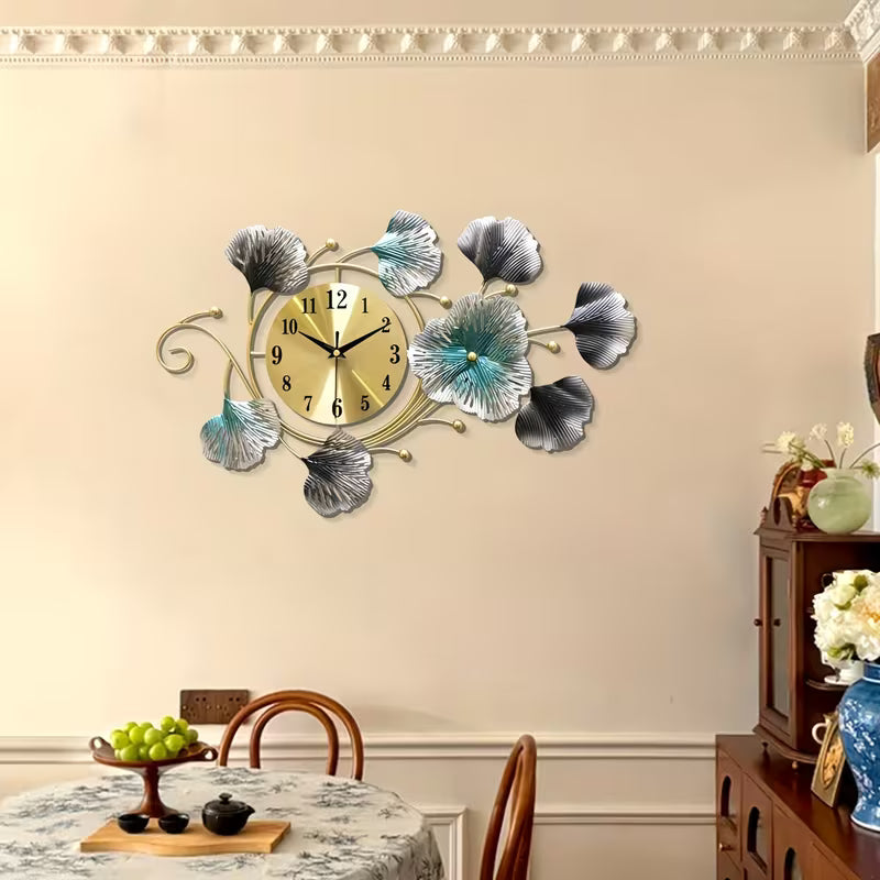 Decorative wall clock with floral design on a beige wall.