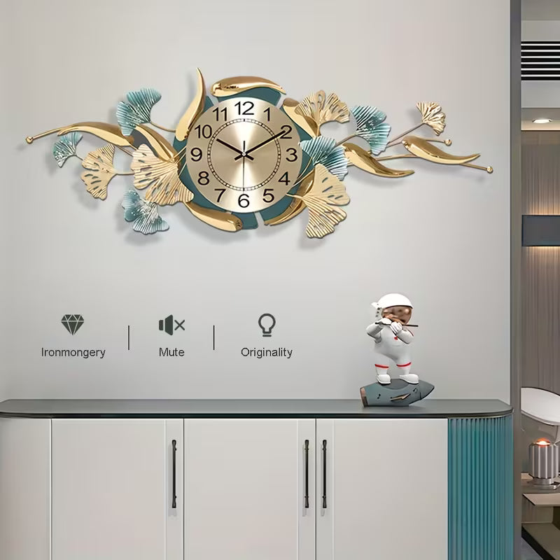 Decorative wall clock with floral designs on a wall above a cabinet.