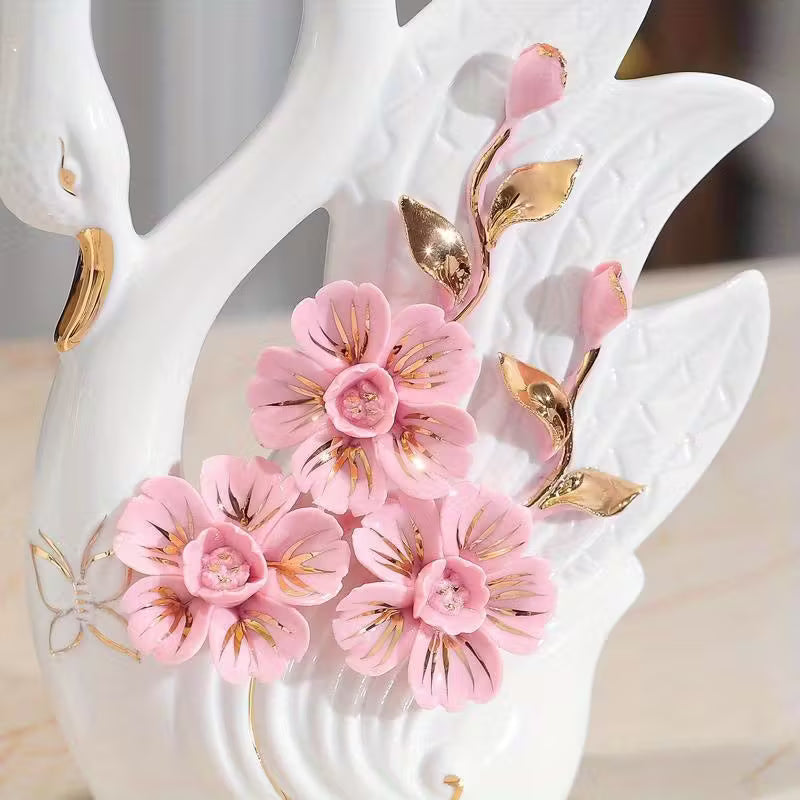 Decorative item with pink flowers and gold leaves on a white background