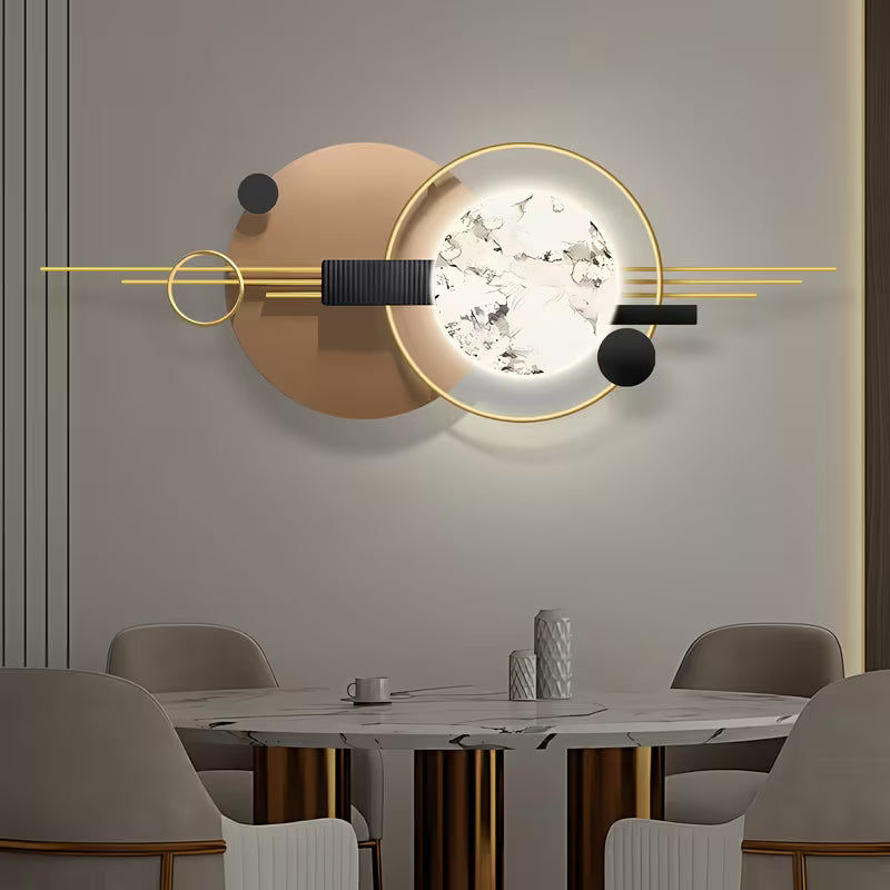 Modern wall light fixture in a dining room setting with a table and chairs.