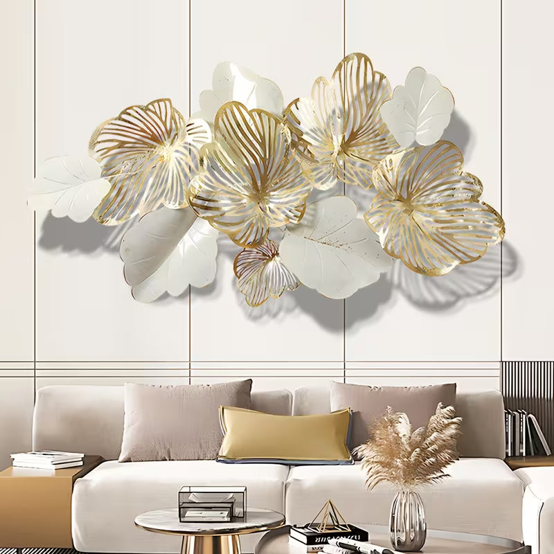 Decorative wall art with gold and white floral designs in a living room setting.
